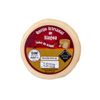 Round artisanal Alagoa cheese with a red and gold label and raw milk certification.